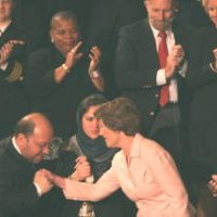 Hamid Gilani, vice-president of Afghan Senate kisses Laura Bush